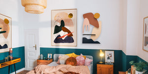 colorful bedroom with abstract art gallery wall 